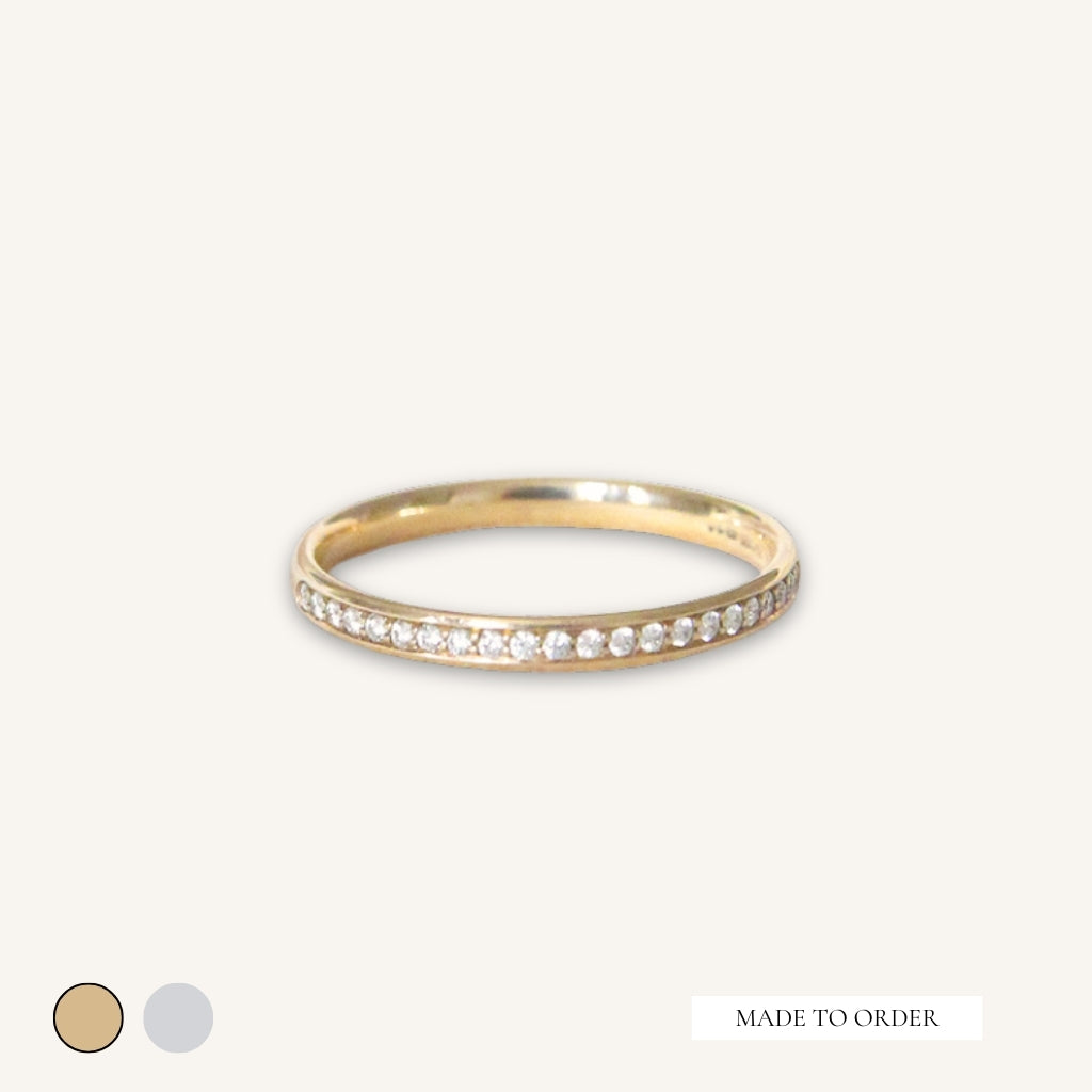 The Micro Claw Diamond Half Eternity Band