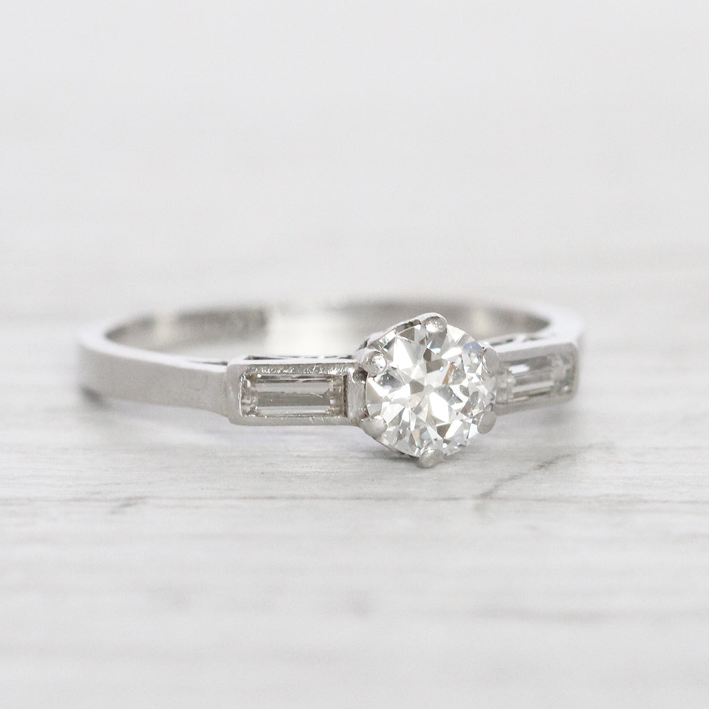 Art Deco 0.50 Carat Old European Cut Diamond Solitaire with Baguette Diamond Shoulders