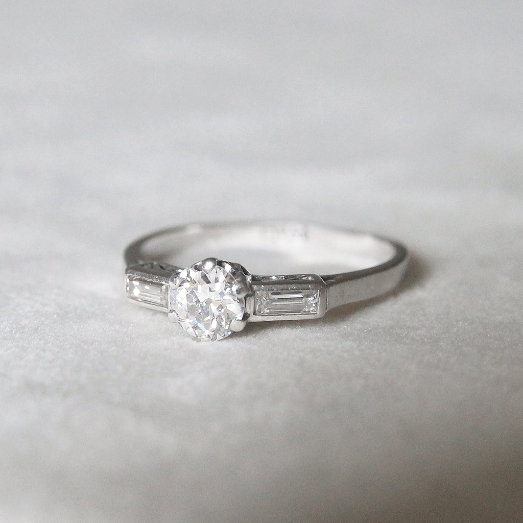 Art Deco 0.50 Carat Old European Cut Diamond Solitaire with Baguette Diamond Shoulders