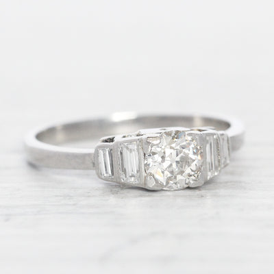 Art Deco 0.50 Carat Old European Cut Diamond Solitaire with Baguette Diamond Shoulders