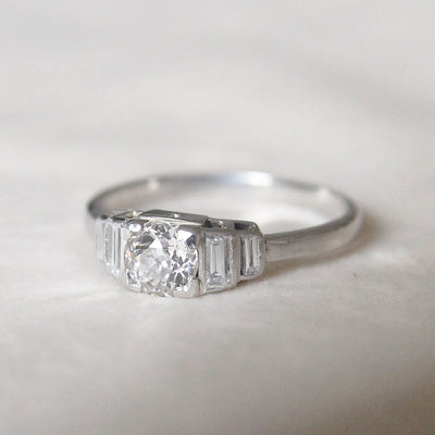 Art Deco 0.50 Carat Old European Cut Diamond Solitaire with Baguette Diamond Shoulders