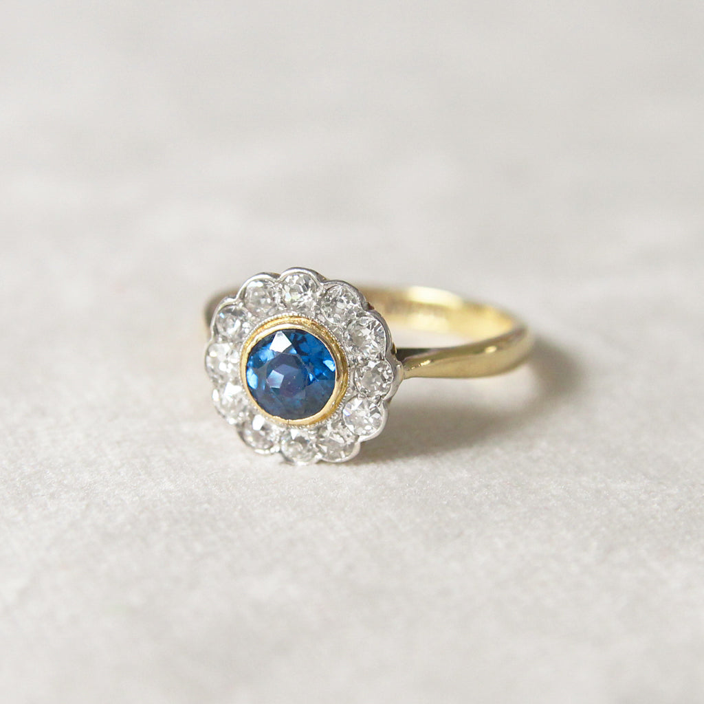 Edwardian 0.60 Carat Sapphire and Old Cut Diamond Cluster Ring