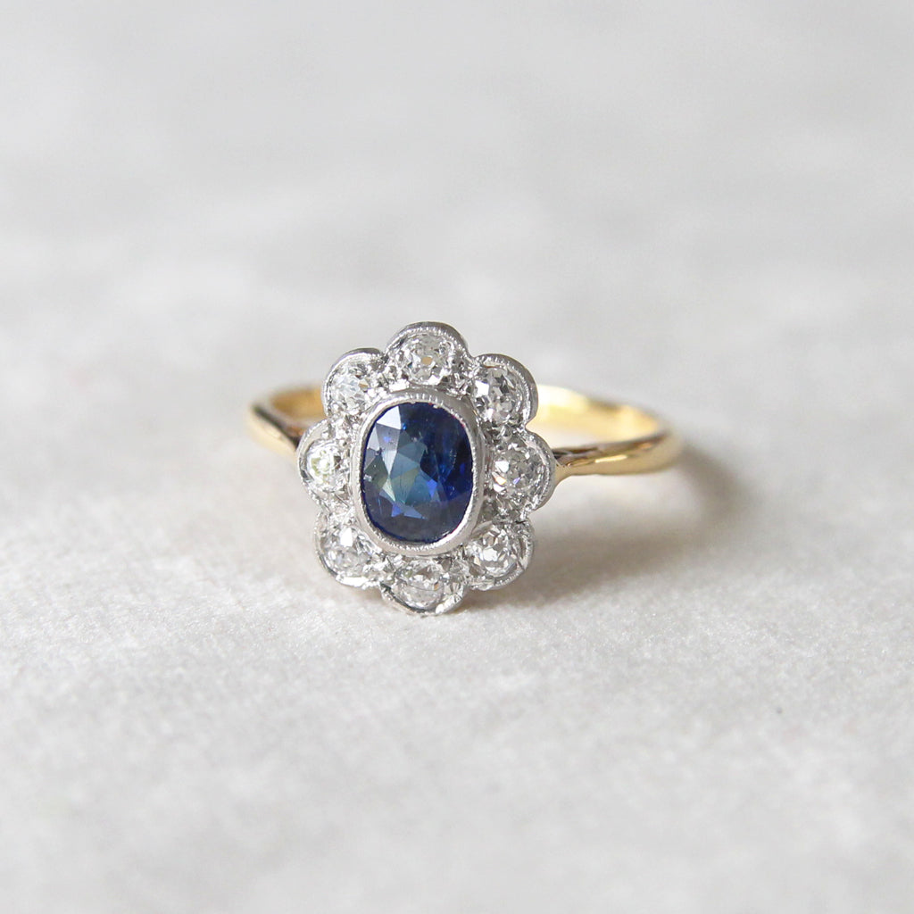 Edwardian 0.63 Carat Sapphire and Old Cut Diamond Cluster Ring