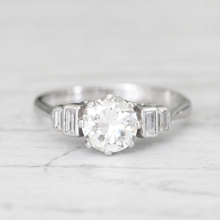 Vintage 1.23 Carat Brilliant Cut Diamond Solitaire with Baguette Diamond Shoulders