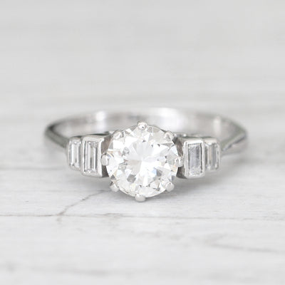 Vintage 1.23 Carat Brilliant Cut Diamond Solitaire with Baguette Diamond Shoulders