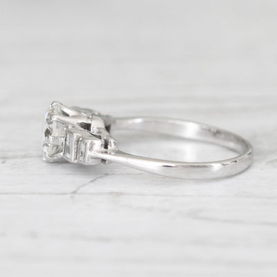 Vintage 1.23 Carat Brilliant Cut Diamond Solitaire with Baguette Diamond Shoulders