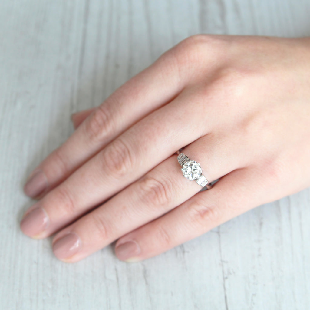 Vintage 1.23 Carat Brilliant Cut Diamond Solitaire with Baguette Diamond Shoulders