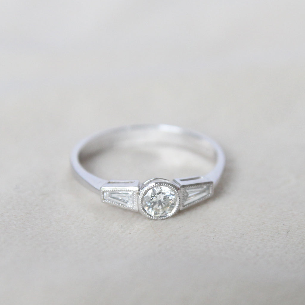 Art Deco Style 0.60 Carat Brilliant and Baguette Cut Diamond Ring