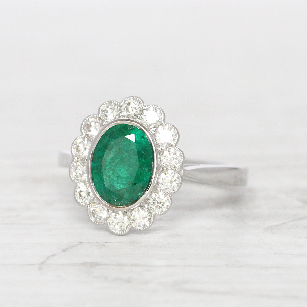 Vintage Style 1.67 Carat Emerald and Diamond Oval Cluster