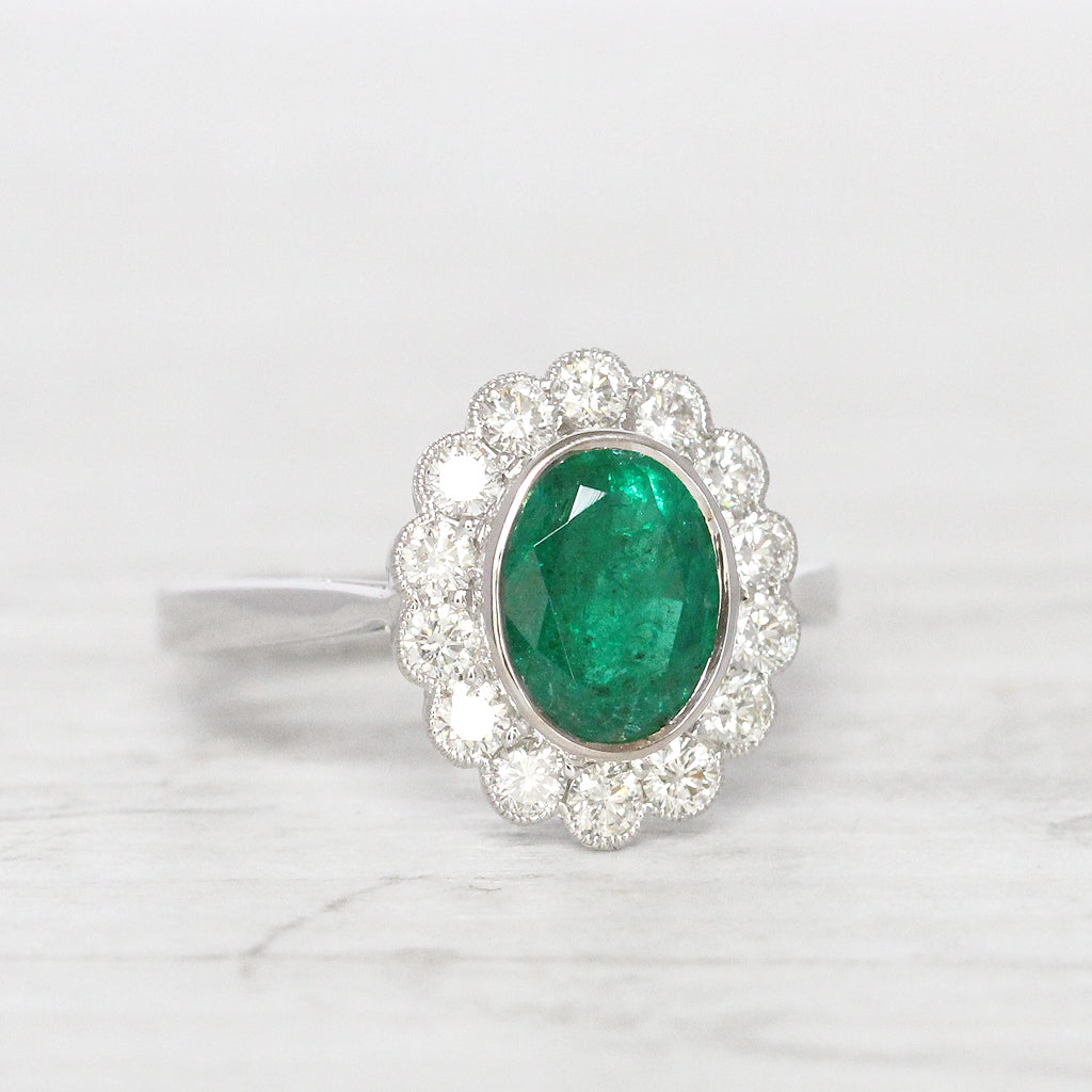 Vintage Style 1.67 Carat Emerald and Diamond Oval Cluster