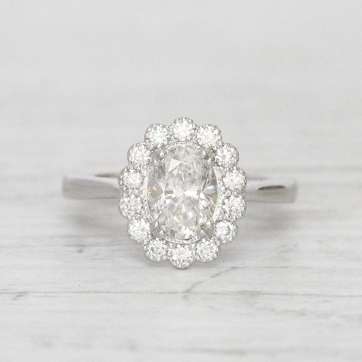 Vintage Style 0.91 Carat Oval Shaped Diamond Halo Cluster