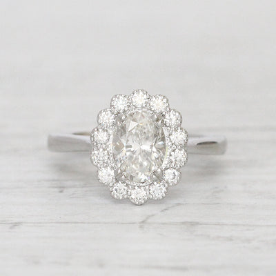 Vintage Style 0.91 Carat Oval Shaped Diamond Halo Cluster