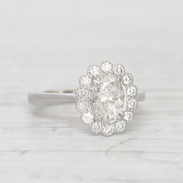 Vintage Style 0.91 Carat Oval Shaped Diamond Halo Cluster