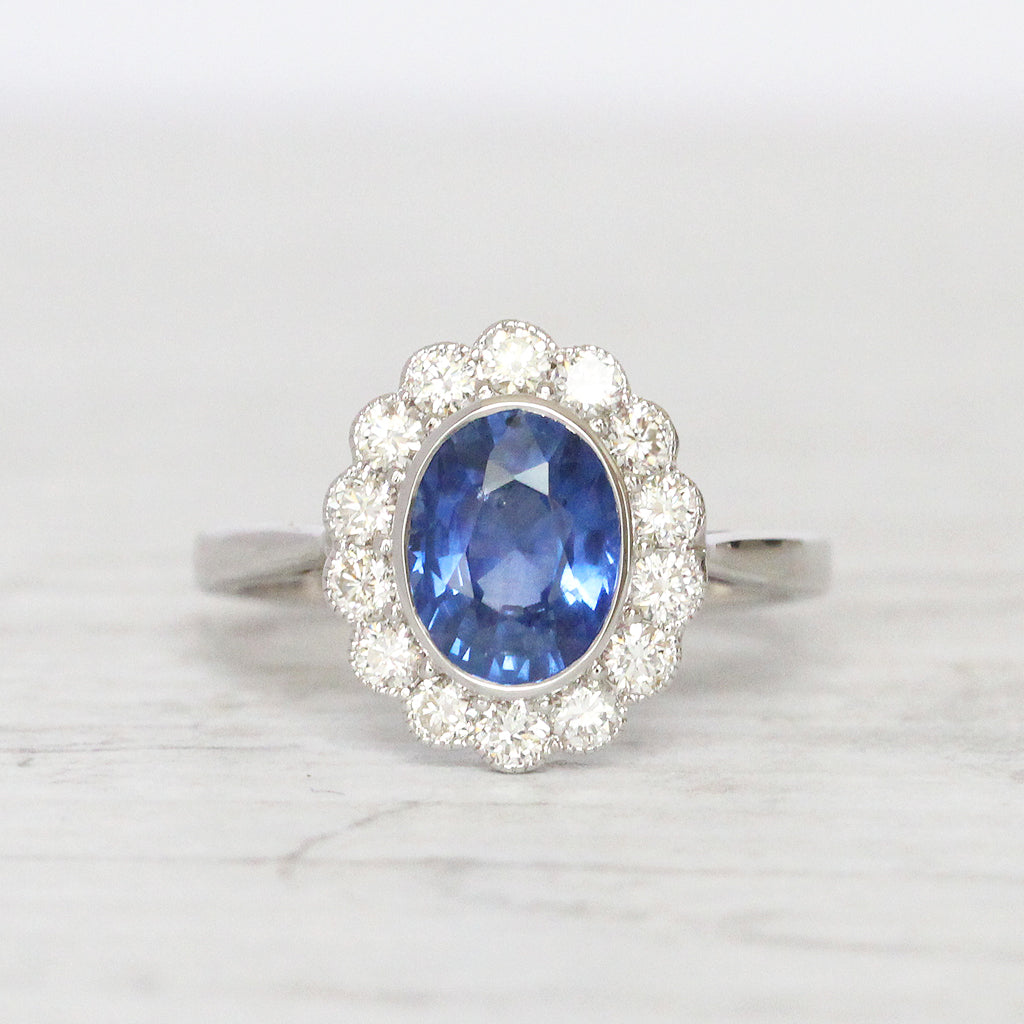 Vintage Style 2.29 Carat Sapphire and Diamond Oval Cluster