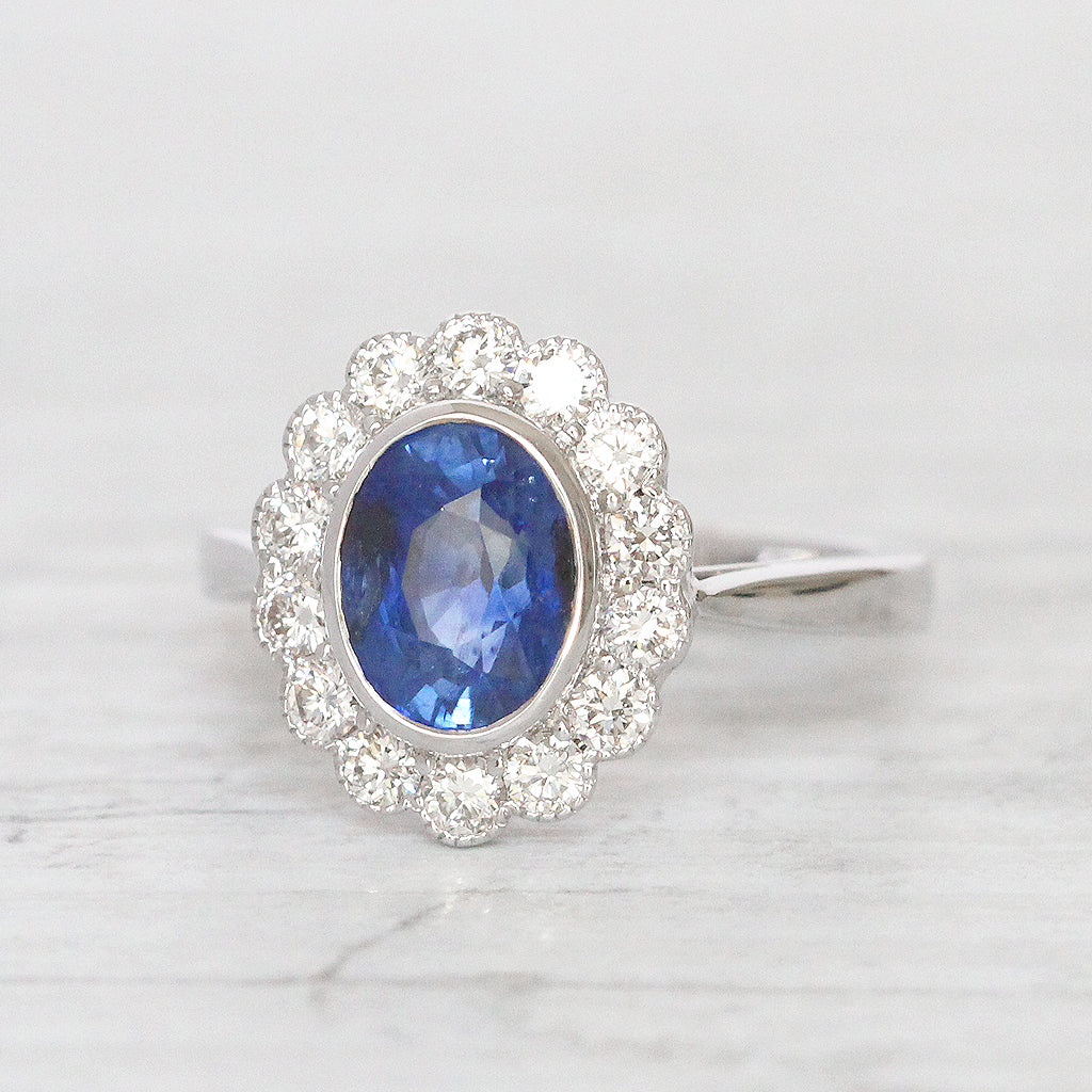 Vintage Style 2.43 Carat Sapphire and Diamond Oval Cluster