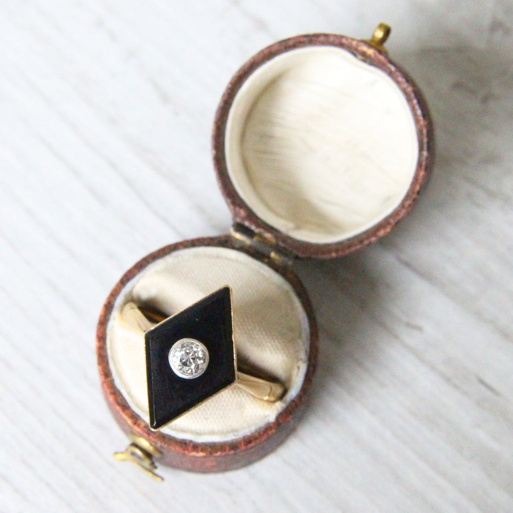 Art Deco Onyx and 0.25 Carat Old Mine Cut Diamond Panel Ring