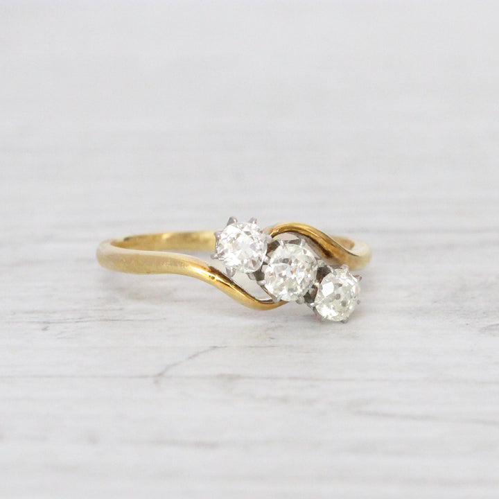 Edwardian 0.50 Carat Old Mine Cut Diamond Crossover Three Stone