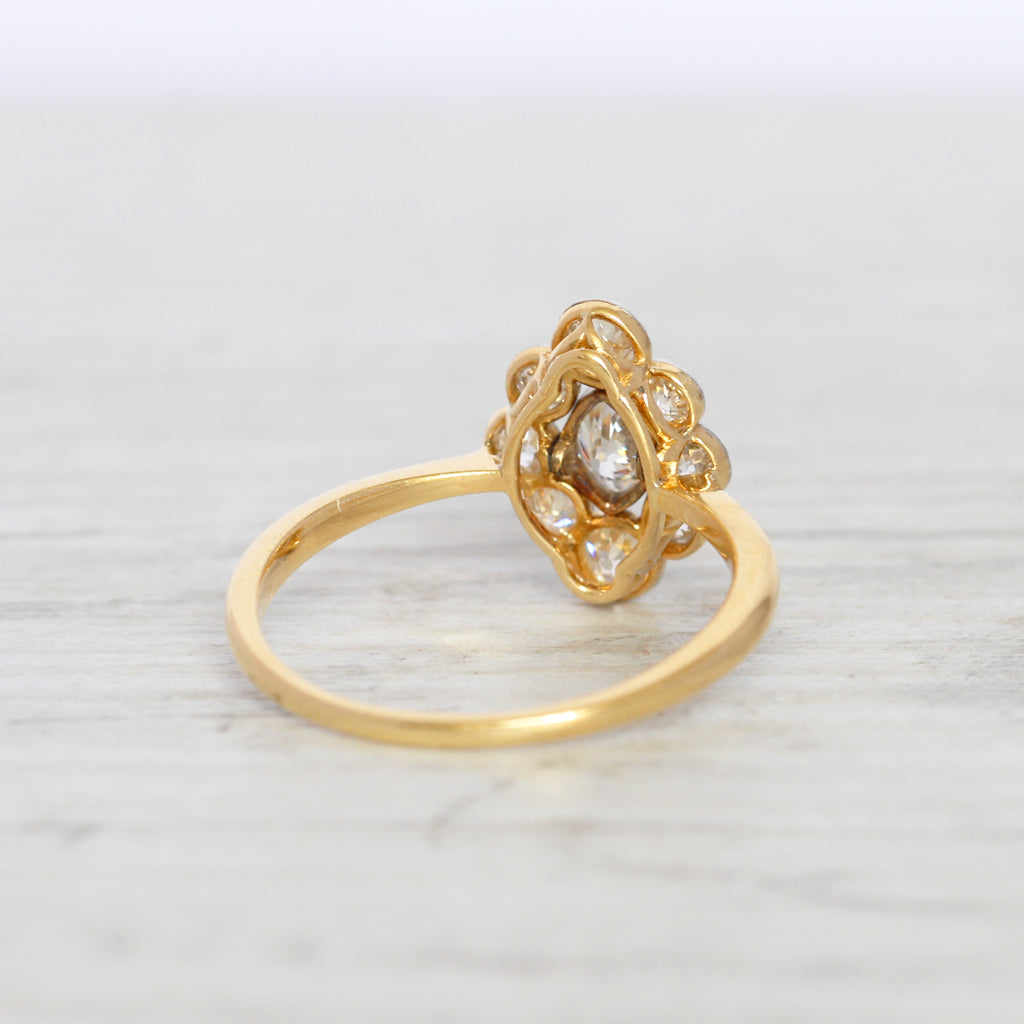 Edwardian 0.96 Carat Moval Old Cut Diamond Cluster Ring