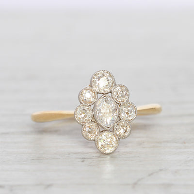 Edwardian 0.96 Carat Moval Old Cut Diamond Cluster Ring