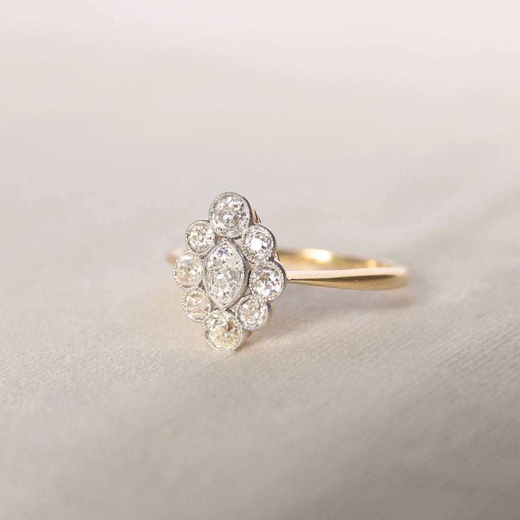 Edwardian 0.96 Carat Moval Old Cut Diamond Cluster Ring